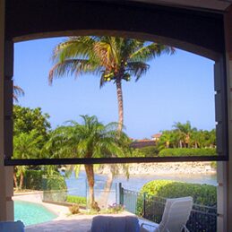 A view of the pool from inside a window.